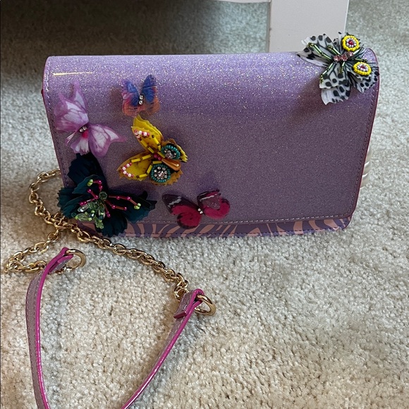 Betsey Johnson Handbags - Betsey Johnson Purple Crossbody Bag with Butterfly Accents